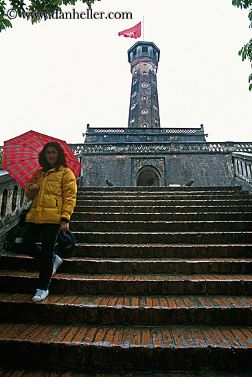 girl-stairs-red-umbrella-vietnam-flag.jpg