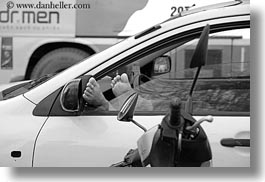 asia, black and white, cars, feet, hanoi, horizontal, vietnam, windows, photograph