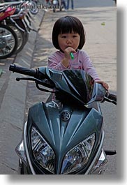 asia, childrens, girls, hanoi, motorcycles, people, toddlers, vertical, vietnam, photograph