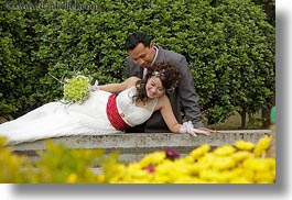 images/Asia/Vietnam/Hanoi/People/Couples/reclining-bride-n-broom-w-flowers-by-water-2.jpg
