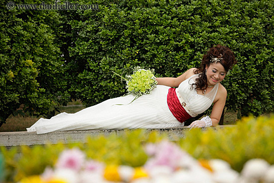 reclining-bride-w-flowers-by-water-1.jpg