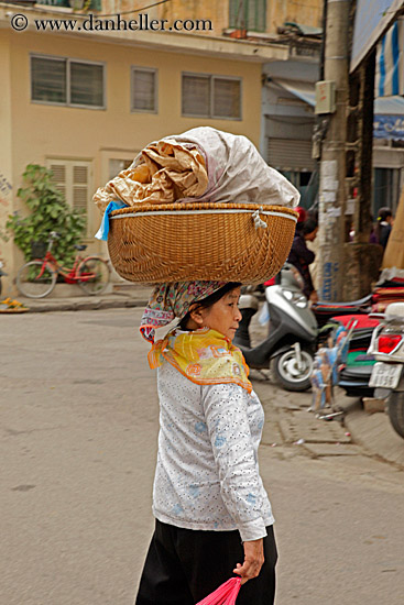 woman-carrying-wicker-basket-on-head.jpg