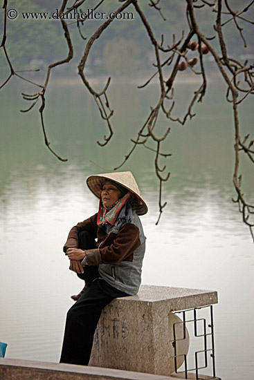 woman-sitting-by-water-n-branches-1.jpg