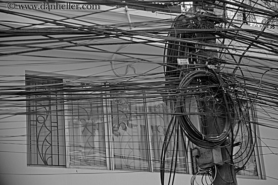 tangled-telephone-wires-n-bldg-2-bw.jpg