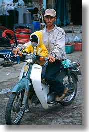 asia, bikes, hoi an, men, moped, toddlers, vertical, vietnam, photograph