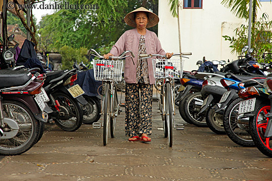 old-woman-walking-bikes.jpg