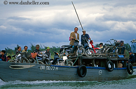 men-n-motorcycles-on-boat.jpg