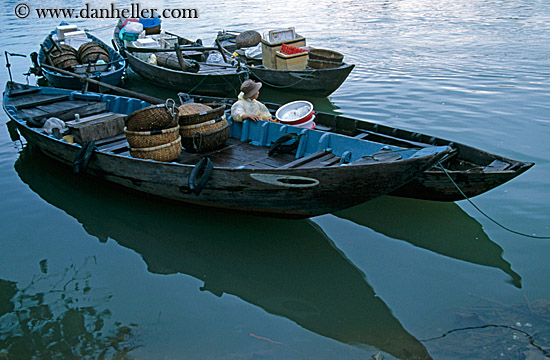 woman-n-boat-w-baskets.jpg