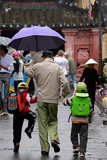 boys-walking-w-old-man-w-umbrella-2.jpg