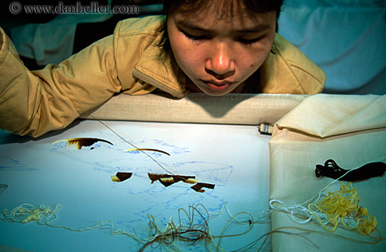 girl-doing-needlepoint.jpg