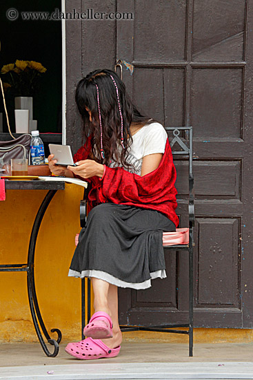 girl-writing-at-cafe-table.jpg