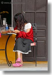 asia, cafes, girls, hoi an, people, tables, vertical, vietnam, womens, writing, photograph