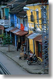 asia, hoi an, motorcycles, people, stores, streets, vertical, vietnam, photograph