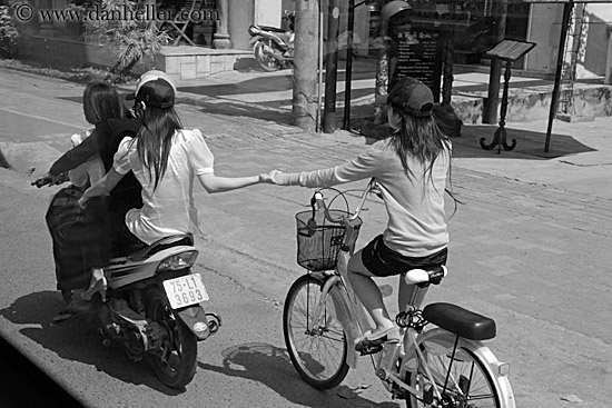 motorcycle-girls-holding-hands-1.jpg