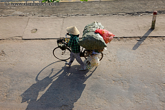 woman-conical-hat-n-bike-4.jpg