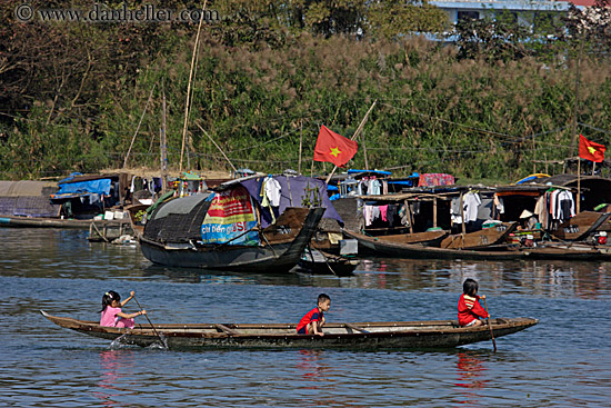 children-paddling-boat-1.jpg