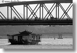 asia, black and white, boats, bridge, ferry, going, horizontal, hue, under, vietnam, photograph