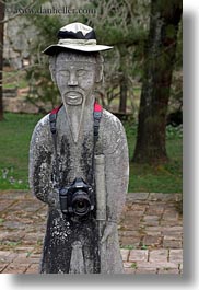 asia, cameras, hue, khai dinh, soldiers, statues, stones, tu duc tomb, vertical, vietnam, photograph