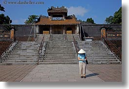 asia, clothes, conical, gates, hats, horizontal, hue, khai dinh, khiem cung, tu duc tomb, vietnam, womens, photograph