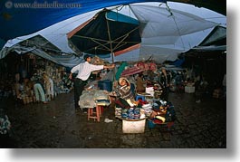 asia, helping, horizontal, hue, market, men, umbrellas, vietnam, photograph