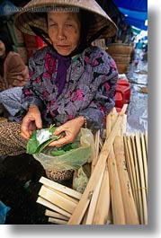 asia, hue, leaves, market, vertical, vietnam, womens, photograph