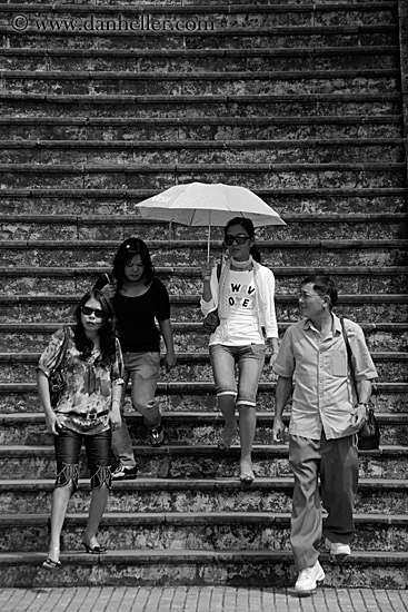 family-w-umbrella-on-steps-bw.jpg