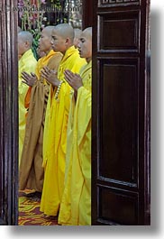 images/Asia/Vietnam/Hue/ThienMuPagoda/monks-praying-thru-doorway-04.jpg