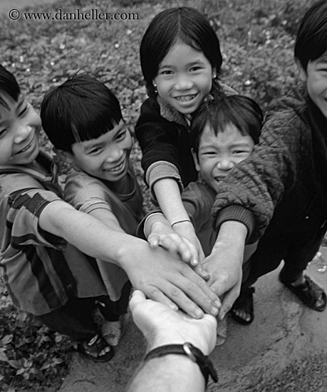 kids-touching-hands-1-bw.jpg