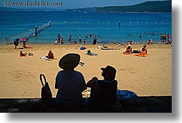 australia, beaches, clothes, hats, horizontal, manly beach, people, silhouettes, sydney, photograph