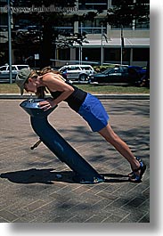 angle, australia, clothes, drinking, fountains, hats, humor, jills, manly beach, people, sydney, tourists, vertical, womens, photograph