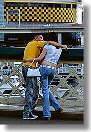 activities, australia, couples, emotions, kissing, people, romantic, sydney, vertical, yellow, photograph