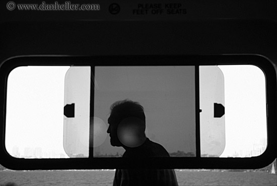 man-walking-by-window-bw.jpg