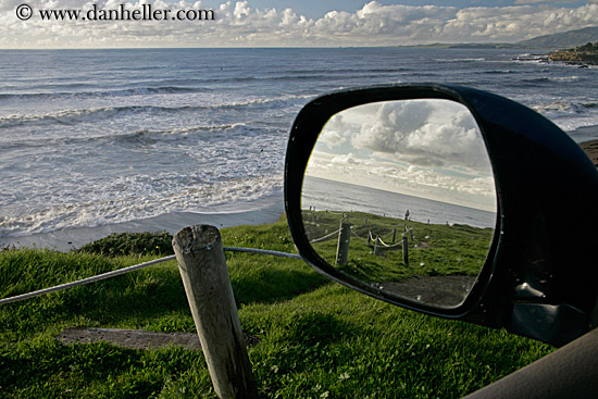 green-grass-n-rope-fence-to-ocean-mirror.jpg