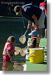 baseball cap, boys, california, childrens, clothes, fathers, fishing, girls, hats, kings canyon, men, nets, people, vertical, west coast, western usa, photograph