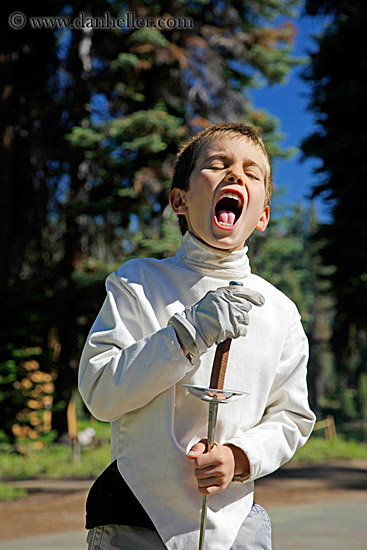 boy-singing-into-sword-1.jpg