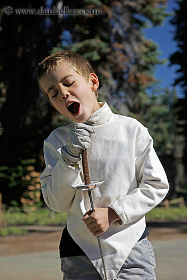 boy-singing-into-sword-2.jpg