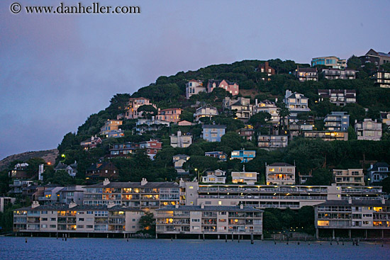 houses-on-hill-by-water.jpg