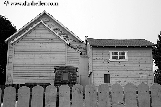 fence-n-gray-building.jpg