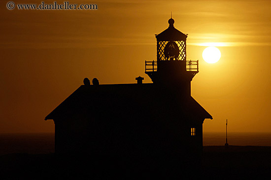 lighthouse-silhouette-n-sun-1.jpg