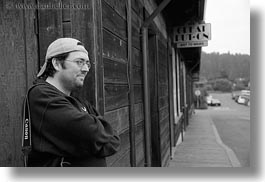 baseball cap, black and white, california, clothes, emotions, hats, horizontal, jason, men, mendocino, people, smiles, streets, west coast, western usa, photograph