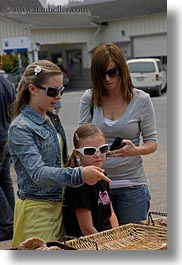 california, childrens, clothes, girls, mendocino, mothers, people, sunglasses, vertical, west coast, western usa, womens, photograph