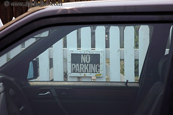 no_parking-sign-thru-car-window.jpg