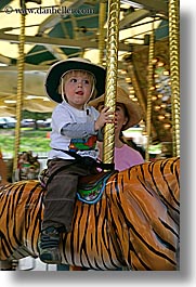 amusement park ride, boys, california, childrens, happy, hats, jacks, merry go round, oakland zoo, toddlers, vertical, west coast, western usa, photograph