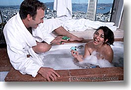 bathtub, california, horizontal, people, san francisco, squirtguns, tub, west coast, western usa, photograph