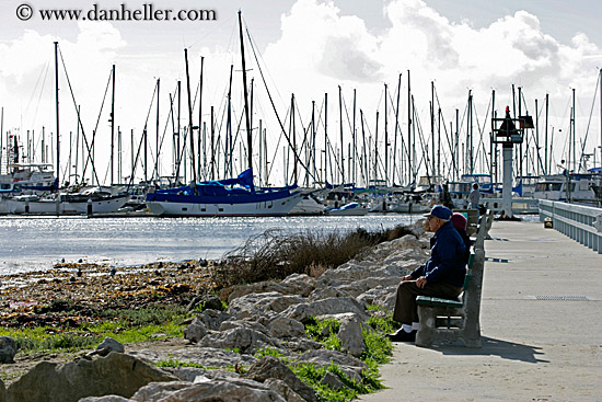 elderly-couple-on-bench-w-sailboats.jpg