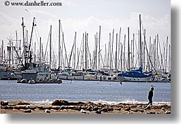 images/California/SantaBarbara/Beach/man-walking-on-beach-w-sailboats.jpg