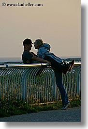 baseball cap, boys, california, clothes, conceptual, couples, emotions, girls, hats, men, people, railing, romantic, santa cruz, teenage, teenagers, vertical, west coast, western usa, womens, photograph