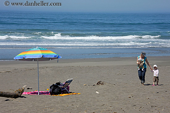 colored-umbrella-on-beach-w-mother-n-child.jpg