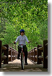 bicycles, bikes, boys, bridge, california, chase, nature, people, plants, structures, teenagers, transportation, trees, vertical, west coast, western usa, yosemite, photograph