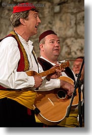 croatia, dubrovnik, europe, folk dancing, guitars, men, musicians, singers, vertical, photograph